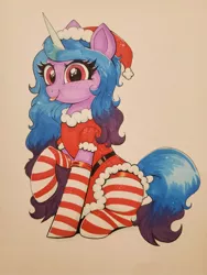 Size: 768x1024 | Tagged: safe, artist:confetticakez, derpibooru import, izzy moonbow, pony, unicorn, my little pony: a new generation, :p, christmas, clothes, costume, female, g5, hat, holiday, image, jpeg, santa costume, santa hat, simple background, solo, tongue out, traditional art