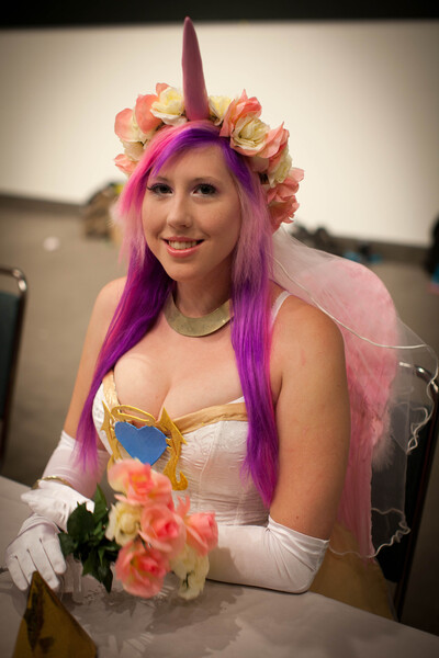 Size: 3162x4743 | Tagged: safe, artist:unkcos19, derpibooru import, princess cadance, human, anime expo, anime expo 2012, breasts, cleavage, clothes, cosplay, costume, flower, gloves, image, irl, irl human, jpeg, long gloves, photo