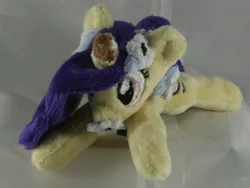 Size: 1957x1468 | Tagged: safe, artist:bastler, derpibooru import, oc, oc:cinnamon string, unofficial characters only, pony, unicorn, cookie, female, flower, flower in hair, food, horn, image, irl, jpeg, mare, photo, plushie, unicorn oc