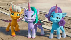 Size: 2388x1336 | Tagged: safe, derpibooru import, screencap, pony, my little pony: make your mark, my little pony: make your mark chapter 2, spoiler:g5, spoiler:my little pony: make your mark chapter 2, ali-conned, cute, fake alicorn, fake horn, fake wings, female, filly, foal, g5, glory (g5), image, jpeg, peach fizz, seashell (g5), smiling, street, teeth, tracks, weapons-grade cute