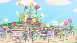Size: 2880x1620 | Tagged: safe, derpibooru import, screencap, my little pony: tell your tale, canterlogic building, flower, g5, giant flower, image, maretime bay, no pony, plant, png, rose, scenery, town