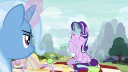 Size: 1334x750 | Tagged: safe, derpibooru import, screencap, starlight glimmer, trixie, pony, unicorn, student counsel, cup, cupcake, duo, duo female, eating, eyes closed, female, food, image, mare, png, sandwich, teacup, teapot