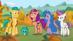 Size: 3072x1727 | Tagged: safe, derpibooru import, screencap, hitch trailblazer, izzy moonbow, sparky sparkeroni, sunny starscout, zipp storm, dragon, earth pony, pegasus, pony, unicorn, filly filling, my little pony: tell your tale, spoiler:g5, spoiler:my little pony: tell your tale, spoiler:tyts01e33, baby, baby dragon, female, g5, grin, high res, image, jpeg, male, mare, pumpkin, smiling, stallion, upscaled, youtube link