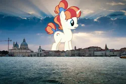 Size: 1024x683 | Tagged: safe, artist:cantercoltz, artist:jaredking779, derpibooru import, rainbow stars, pony, unicorn, background pony, bow, female, giant pony, giant unicorn, giantess, hair bow, highrise ponies, image, irl, italy, jpeg, macro, mare, mega giant, photo, ponies in real life, tail, tail bow, venice