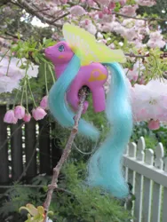 Size: 774x1032 | Tagged: safe, derpibooru import, photographer:normaleeinsane, fence, g1, image, jpeg, sun glider, toy, tree, windy wing ponies