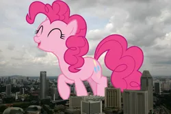 Size: 1000x667 | Tagged: safe, artist:cloudyglow, artist:jaredking779, derpibooru import, pinkie pie, earth pony, pony, eyes closed, female, giant pinkie pie, giant pony, giant/macro earth pony, giantess, highrise ponies, image, irl, jpeg, macro, mare, mega giant, open mouth, photo, ponies in real life, singapore, smiling, solo