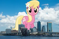 Size: 2447x1627 | Tagged: safe, derpibooru import, lily, lily valley, earth pony, pony, background pony, female, florida, flower, flower in hair, giant pony, giant/macro earth pony, giantess, high res, highrise ponies, image, irl, jacksonville, lily (flower), macro, mare, mega giant, photo, png, ponies in real life