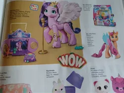 Size: 4000x3000 | Tagged: safe, derpibooru import, izzy moonbow, pipp petals, sparky sparkeroni, sunny starscout, alicorn, pegasus, pony, my little pony: a new generation, g5, image, irl, jpeg, lantern, logo, magazine, merchandise, musical mane melody, my little pony logo, photo, race swap, sunnycorn, toy, toys r us, wow