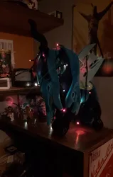 Size: 2268x3567 | Tagged: safe, derpibooru import, queen chrysalis, sweetie belle, garland, image, irl, jpeg, nuka cola, photo, plushie, solaire of astora, string lights