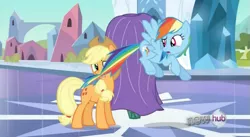 Size: 639x350 | Tagged: safe, derpibooru import, screencap, applejack, rainbow dash, earth pony, pegasus, pony, the crystal empire, biting, confused, crystal castle, crystal empire, duo, duo female, female, flying, hub logo, image, logo, looking at each other, looking at someone, mare, open mouth, png, spread wings, tail, tail bite, the hub, wings