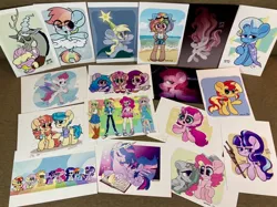 Size: 1478x1108 | Tagged: photographer needed, safe, artist:oc_ponys, derpibooru import, applejack, derpy hooves, discord, fluttershy, izzy moonbow, marble pie, pinkie pie, pipp petals, rainbow dash, rarity, starlight glimmer, sunny starscout, sunset shimmer, trixie, twilight sparkle, zipp storm, oc, oc:double circle, draconequus, earth pony, human, pegasus, pony, unicorn, equestria girls, beach, book, dark skin, eared humanization, female, filly, foal, g5, goggles, goggles on head, humanized, image, jpeg, mare, older, older twilight, photo, s5 starlight, starry eyes, wingding eyes, younger