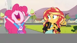 Size: 3410x1920 | Tagged: safe, derpibooru import, screencap, pinkie pie, sunset shimmer, equestria girls, friendship games, backpack, clothes, cupcake, cutie mark, cutie mark on clothes, duo, duo female, female, food, high res, image, jacket, jpeg, leather, leather jacket, nose in the air, open mouth, open smile, smiling, statue, uvula, volumetric mouth