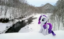 Size: 2048x1236 | Tagged: safe, derpibooru import, photographer:pakapaka1993, rarity, pony, unicorn, image, irl, irl photo, japan, jpeg, photo, plushie, river, snow, solo, tree, water, winter