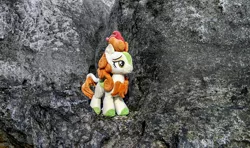 Size: 2048x1210 | Tagged: safe, derpibooru import, photographer:pakapaka1993, autumn blaze, kirin, image, irl, irl photo, japan, jpeg, photo, plushie, rock, solo