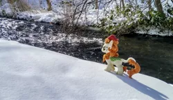 Size: 2048x1188 | Tagged: safe, derpibooru import, photographer:pakapaka1993, autumn blaze, kirin, image, irl, irl photo, japan, jpeg, photo, plant, plushie, river, snow, water, winter