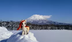 Size: 2048x1212 | Tagged: safe, derpibooru import, photographer:pakapaka1993, oc, oc:poniko, unofficial characters only, earth pony, pony, cloud, earth pony oc, image, irl, irl photo, japan, jpeg, mountain, photo, plushie, snow, solo, tree, winter