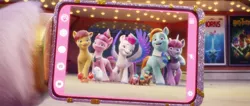 Size: 1884x797 | Tagged: safe, derpibooru import, screencap, pipp petals, zipp storm, armadillo, bird, crab, earth pony, pegasus, pony, seagull, unicorn, my little pony: a new generation, spoiler:my little pony: a new generation, app, cinema, critter, g5, hoof hold, hooves, horns, image, iphone, mobile phone, movie poster, phone, png, pose, smartphone, smiling, sweets (g5), toots (g5)