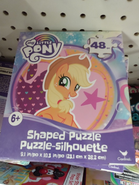 Size: 3120x4160 | Tagged: photographer needed, safe, derpibooru import, applejack, earth pony, pony, applejack's hat, cowboy hat, dollar tree, female, freckles, grin, hat, high res, image, irl, irl photo, jpeg, looking at you, mare, my little pony logo, photo, puzzle, smiling, solo