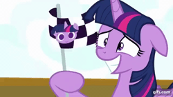 Size: 640x360 | Tagged: safe, derpibooru import, screencap, twilight sparkle, twilight sparkle (alicorn), alicorn, pony, once upon a zeppelin, season 7, airship, animated, female, flag, floppy ears, gif, gifs.com, grin, image, mare, nervous, nervous grin, sky, smiling, solo, zeppelin