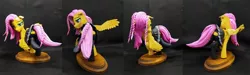 Size: 2075x622 | Tagged: safe, artist:vita96, derpibooru import, fluttershy, pegasus, pony, braid, braided tail, clothes, craft, female, image, jpeg, mare, polymer clay, sculpture, skirt, socks, solo, spread wings, tail, thigh highs, wings
