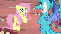 Size: 1280x720 | Tagged: safe, derpibooru import, screencap, fluttershy, princess ember, dragon, pegasus, pony, sweet and smoky, dragon egg, dragoness, duo, duo female, egg, female, hand on hip, image, mare, png
