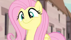 Size: 1258x720 | Tagged: safe, derpibooru import, screencap, fluttershy, pegasus, pony, season 5, the cutie map, cute, female, flutterbob, happy, image, in our town, jpeg, mare, party soft, shyabetes, smiling, solo