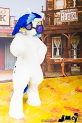 Size: 1330x2000 | Tagged: safe, artist:luna_b_, derpibooru import, vinyl scratch, anthro, human, 2015, arm hooves, clothes, convention, convention:jmof, cosplay, costume, fursuit, image, irl, irl human, japan, jpeg, name tag, no mouth, photo, pointing at you, ponysuit, solo, sunglasses, vinyl's glasses, wild west