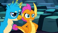 Size: 1920x1080 | Tagged: safe, derpibooru import, screencap, gallus, smolder, dragon, gryphon, uprooted, dragoness, female, gallus is not amused, hand on hip, image, jpeg, male, smolder is not amused, unamused