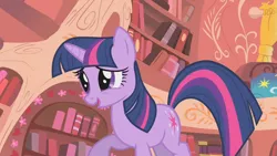 Size: 1280x720 | Tagged: safe, derpibooru import, screencap, twilight sparkle, pony, unicorn, look before you sleep, season 1, cute, female, golden oaks library, image, library, mare, open mouth, open smile, png, raised hoof, smiling, solo, twiabetes, unicorn twilight