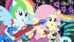 Size: 3410x1920 | Tagged: safe, derpibooru import, screencap, fluttershy, rainbow dash, equestria girls, rainbow rocks, shake your tail, duo, duo female, electric guitar, female, guitar, high res, image, jpeg, musical instrument, open mouth, open smile, ponied up, smiling, spread wings, tambourine, wings