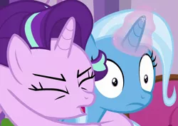 Size: 871x615 | Tagged: safe, derpibooru import, screencap, starlight glimmer, trixie, pony, unicorn, all bottled up, cropped, duo, eyes closed, female, glomp, hug, image, magic, magic aura, mare, out of context, png, tackle, wide eyes