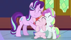 Size: 1280x720 | Tagged: safe, derpibooru import, screencap, coconut cream, starlight glimmer, toola roola, earth pony, pony, unicorn, fame and misfortune, :t, ^^, c:, cheek squish, coconut cute, cute, daaaaaaaaaaaw, eyes closed, female, filly, foal, glimmerbetes, group hug, hnnng, hug, image, mare, multicolored hair, multicolored mane, png, roolabetes, smiling, squishy cheeks, trio, trio female, weapons-grade cute