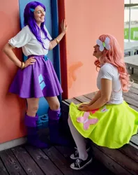 Size: 1713x2159 | Tagged: safe, derpibooru import, fluttershy, rarity, human, equestria girls, clothes, cosplay, costume, duo, hand on hip, image, irl, irl human, jpeg, photo, sitting