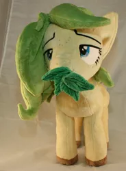 Size: 1580x2144 | Tagged: safe, artist:bastler, derpibooru import, oc, oc:nettle vienna, unofficial characters only, earth pony, pony, female, image, irl, jpeg, leaves, mare, photo, plushie