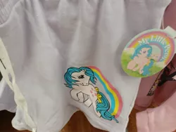 Size: 4000x3000 | Tagged: safe, derpibooru import, earth pony, pony, blue hair, blue mane, bow, clothes, g1, hair bow, image, irl, jpeg, looking at you, merchandise, my little pony logo, pants, photo, ponytail, solo, walmart