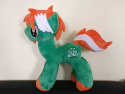 Size: 2828x2121 | Tagged: safe, artist:angelwarrioraurora, derpibooru import, oc, oc:towers, unofficial characters only, earth pony, cutie mark, earth pony oc, freckles, galacon, image, irish, irl, jpeg, logo, photo, plushie, solo, standing