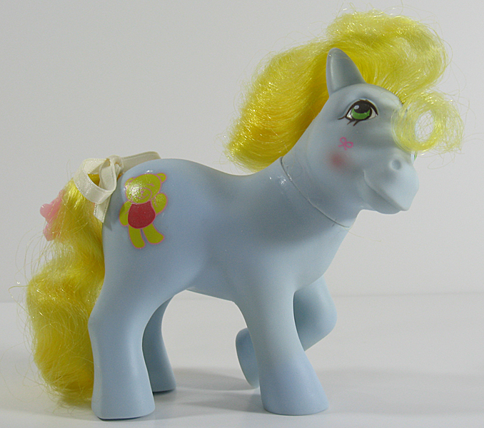 Size: 678x600 | Tagged: safe, derpibooru import, photographer:breyer600, cuddles (g1), earth pony, pony, blushing, bow, cuddledorable, cute, female, g1, image, irl, jpeg, magic message ponies, mare, photo, tail, tail bow, teddi, teddibetes, toy