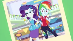 Size: 1920x1080 | Tagged: safe, derpibooru import, screencap, rainbow dash, rarity, equestria girls, equestria girls series, holidays unwrapped, spoiler:eqg series (season 2), 1920x1080, dashing through the mall, duo, duo female, eyeshadow, female, grin, hand on hip, image, lidded eyes, looking at you, makeup, photo, png, rarity peplum dress, smiling, smiling at you