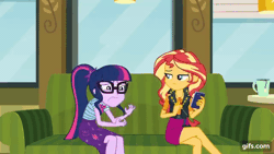 Size: 640x360 | Tagged: safe, derpibooru import, screencap, sci-twi, sunset shimmer, twilight sparkle, equestria girls, equestria girls series, text support, animated, boots, bowtie, clothes, cutie mark, cutie mark on clothes, duo, duo female, eyes closed, female, geode of empathy, geode of telekinesis, gif, gifs.com, glasses, image, jewelry, leather, leather boots, leather vest, magical geodes, mobile phone, mug, necklace, open mouth, phone, ponytail, shoes, smartphone, smiling, text support: sunset shimmer