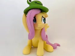 Size: 1280x960 | Tagged: safe, artist:sparkle40559933, derpibooru import, fluttershy, frog, pegasus, pony, craft, hat, image, jpeg, photo, sculpture, smiling, solo, spread wings, wings