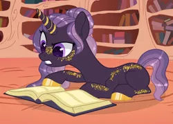 Size: 1280x915 | Tagged: safe, artist:katelynleeann42, derpibooru import, oc, oc:golden shimmer, pony, unicorn, book, female, image, jpeg, lying down, mare, prone, solo