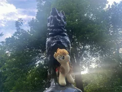 Size: 4032x3024 | Tagged: safe, artist:little-broy-peep, derpibooru import, braeburn, balto, balto statue, central park, clothes, image, irl, jpeg, missing accessory, new york city, photo, plushie, sunset, tree, vest