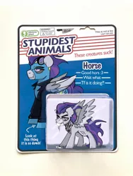 Size: 1154x1536 | Tagged: safe, artist:allicoot, derpibooru import, oc, unofficial characters only, pegasus, pony, black sclera, chest fluff, clothes, fangs, foaming at the mouth, image, jacket, jpeg, obvious plant, photoshop, slit pupils, smiling, solo, spread wings, toy, uniform, wings, wonderbolts uniform