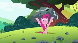 Size: 1280x720 | Tagged: safe, derpibooru import, screencap, pinkie pie, maud pie (episode), grin, image, lifting, png, rock, smiling, solo