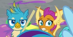 Size: 1188x600 | Tagged: safe, derpibooru import, screencap, gallus, rainbow dash, smolder, dragon, gryphon, pegasus, the hearth's warming club, cropped, gallus is not amused, image, looking at you, offscreen character, png, reaction image, unamused