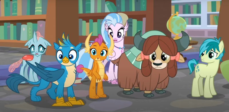 Size: 1502x738 | Tagged: safe, derpibooru import, screencap, gallus, ocellus, sandbar, silverstream, smolder, yona, changedling, changeling, classical hippogriff, dragon, earth pony, gryphon, hippogriff, pony, yak, what lies beneath, bookshelf, bow, cloven hooves, cropped, dragoness, female, globe, hair bow, image, jewelry, monkey swings, necklace, offscreen character, png, student six
