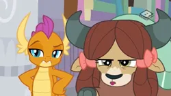 Size: 1249x703 | Tagged: safe, derpibooru import, screencap, smolder, yona, dragon, yak, the hearth's warming club, dragoness, duo, female, hand on hip, image, png, raised eyebrow, smolder is not amused, unamused, yona is not amused