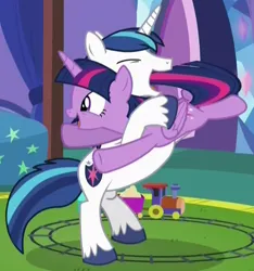 Size: 606x647 | Tagged: safe, derpibooru import, screencap, shining armor, twilight sparkle, twilight sparkle (alicorn), alicorn, pony, unicorn, season 5, the one where pinkie pie knows, bbbff, bedroom, bipedal, brother and sister, cropped, cute, duo, eyes closed, female, happy, hug, image, male, mare, png, shining adorable, siblings, sister spinning, smiling, spinning, stallion, twiabetes, twilight's castle