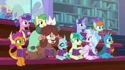Size: 1277x720 | Tagged: safe, derpibooru import, screencap, berry blend, berry bliss, gallus, huckleberry, november rain, ocellus, peppermint goldylinks, sandbar, silverstream, smolder, yona, changedling, changeling, classical hippogriff, dragon, earth pony, gryphon, hippogriff, pegasus, pony, unicorn, yak, the end in friend, bow, cloven hooves, colored hooves, friendship student, hair bow, image, monkey swings, mouth hold, notebook, pencil, png, raised eyebrow, student six