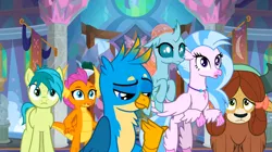 Size: 1600x898 | Tagged: safe, derpibooru import, screencap, gallus, ocellus, sandbar, silverstream, smolder, yona, changedling, changeling, classical hippogriff, dragon, earth pony, gryphon, hippogriff, pony, yak, uprooted, bow, dragoness, female, hair bow, image, jewelry, male, monkey swings, necklace, png, student six